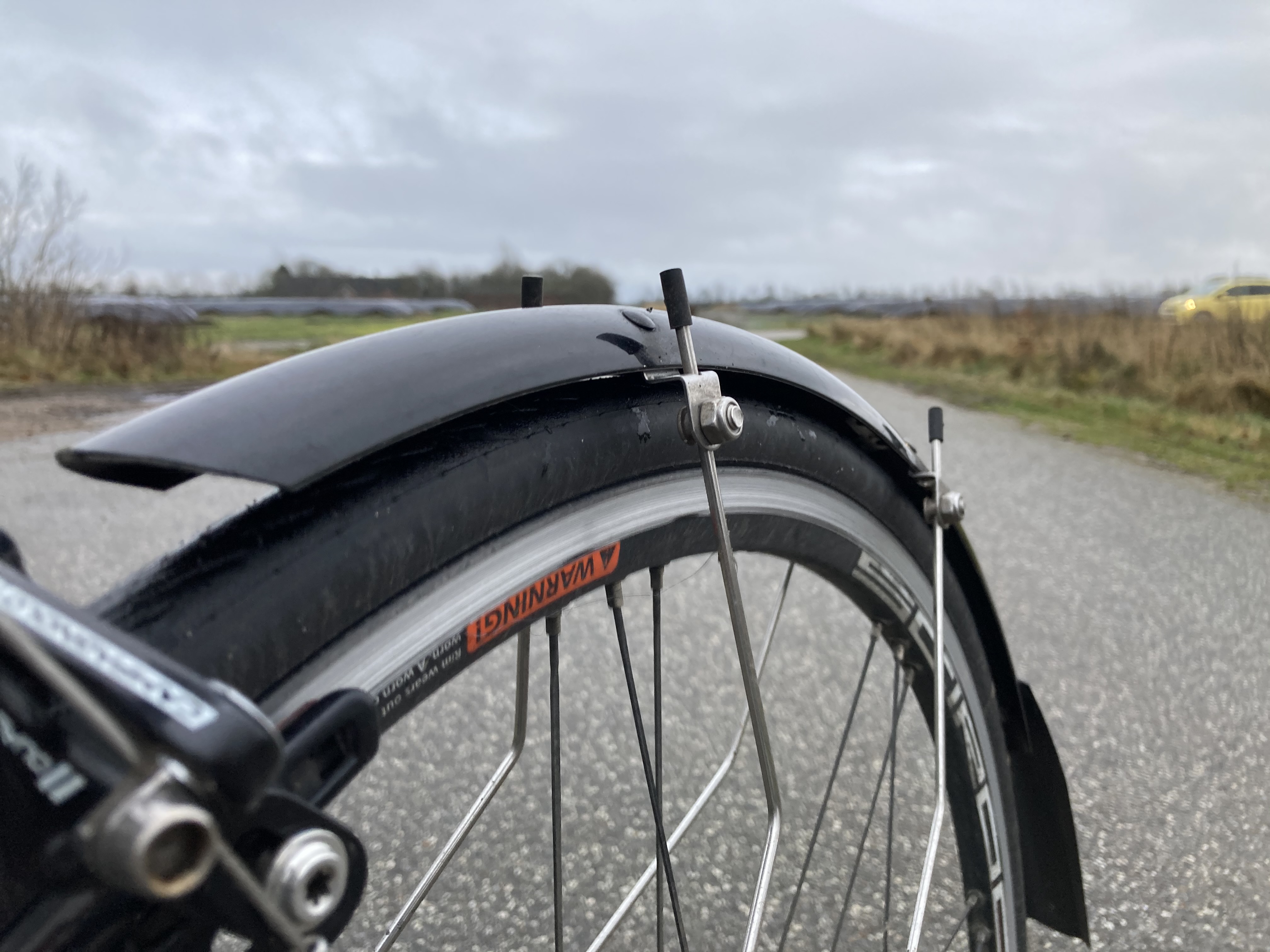 Bagskærmen skal have en god længde, hvis du cykler med andre.